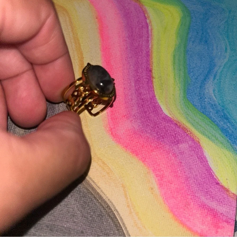 Elegant Gold and Black Ring